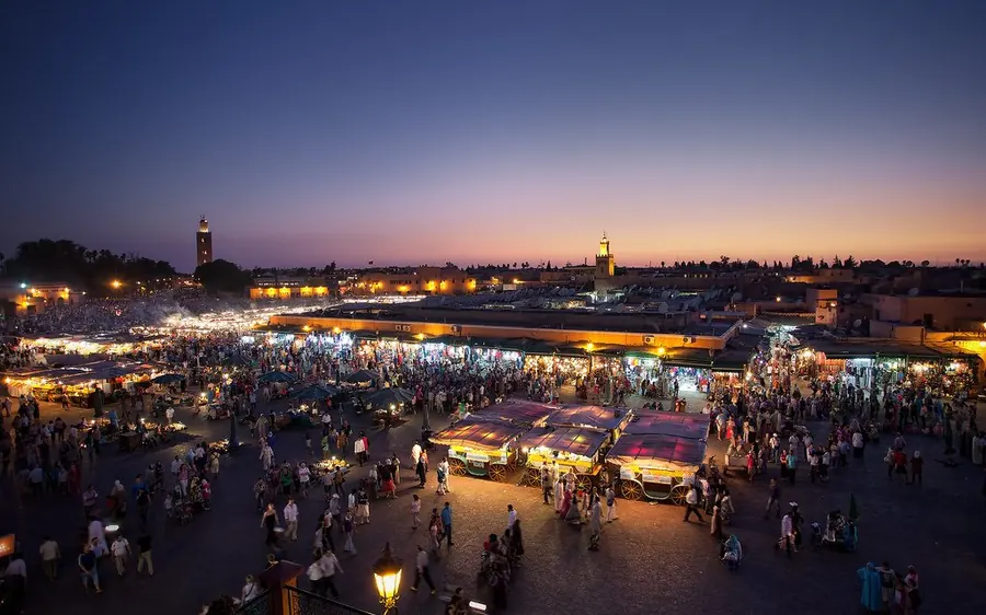 The food stalls of Jemaa el-Fna lit up at night