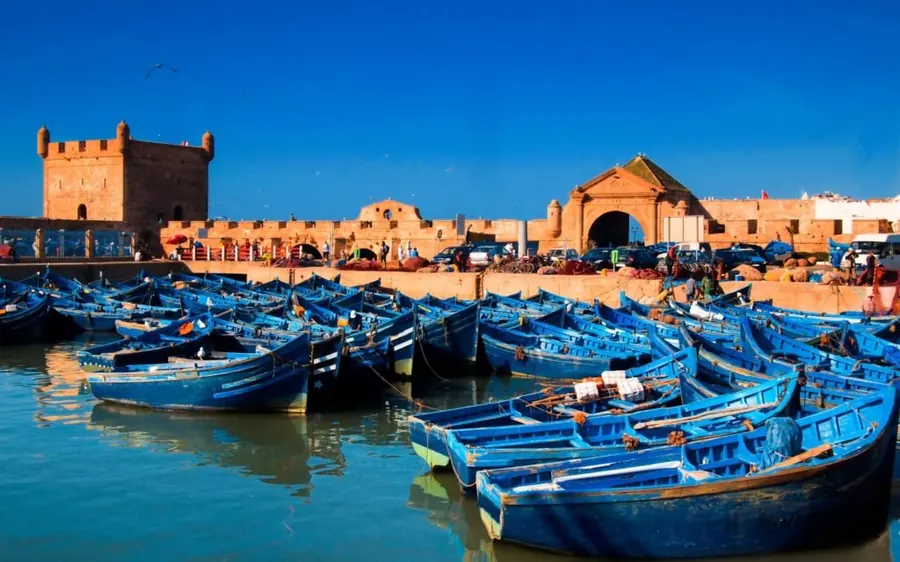 Blue fishing boats in the harbour of Essaouira