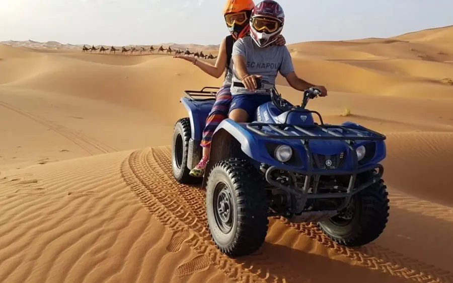A quad bike on the dunes of the Sahara