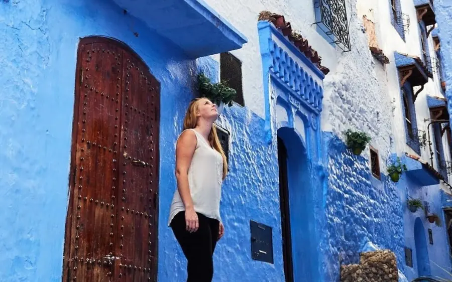 A traveller in the blue streets of Chefchaouen