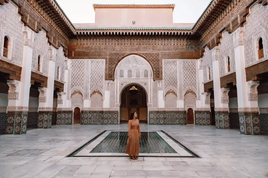 The carved courtyard of the Ben Youssef Madrasa in Marrakech