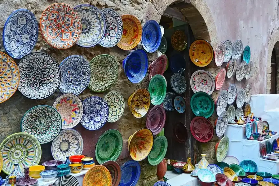 Colourful hand-painted Moroccan plates on a wall